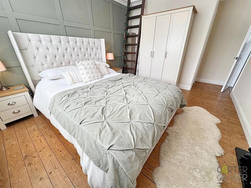 BEDROOM 1 (REAR)