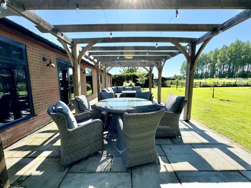 Pool house outside dining view 2