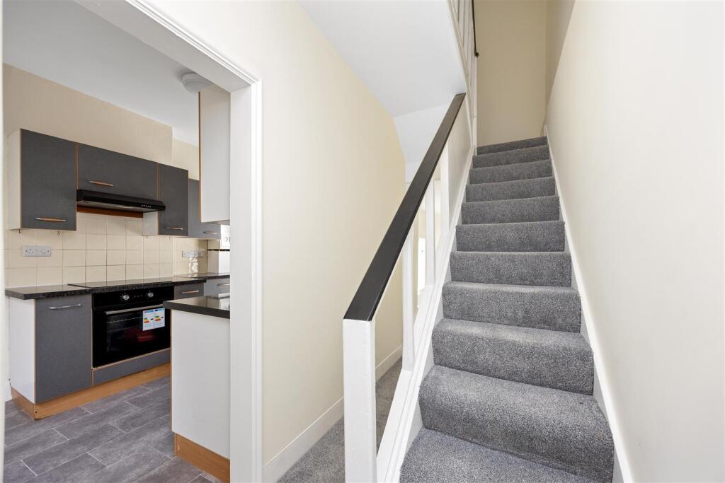 Stairs lowering to Lower Ground Floor