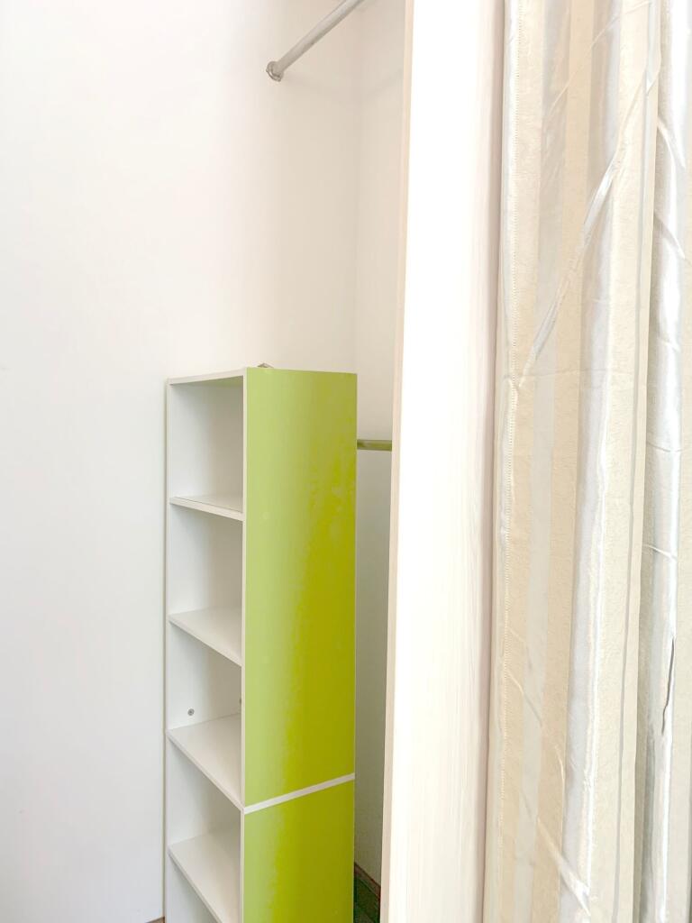 Bright and tidy storage area featuring a modern...