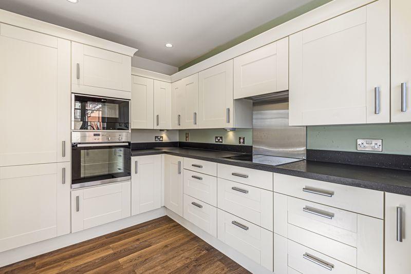Kitchen with built-in appliances