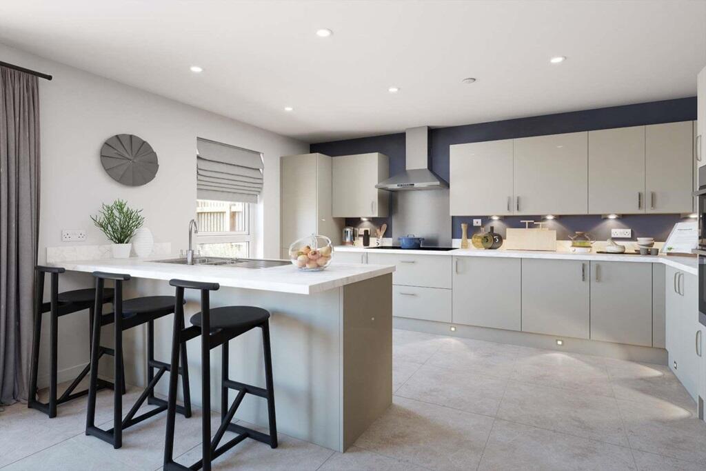 The kitchen features ample workspace