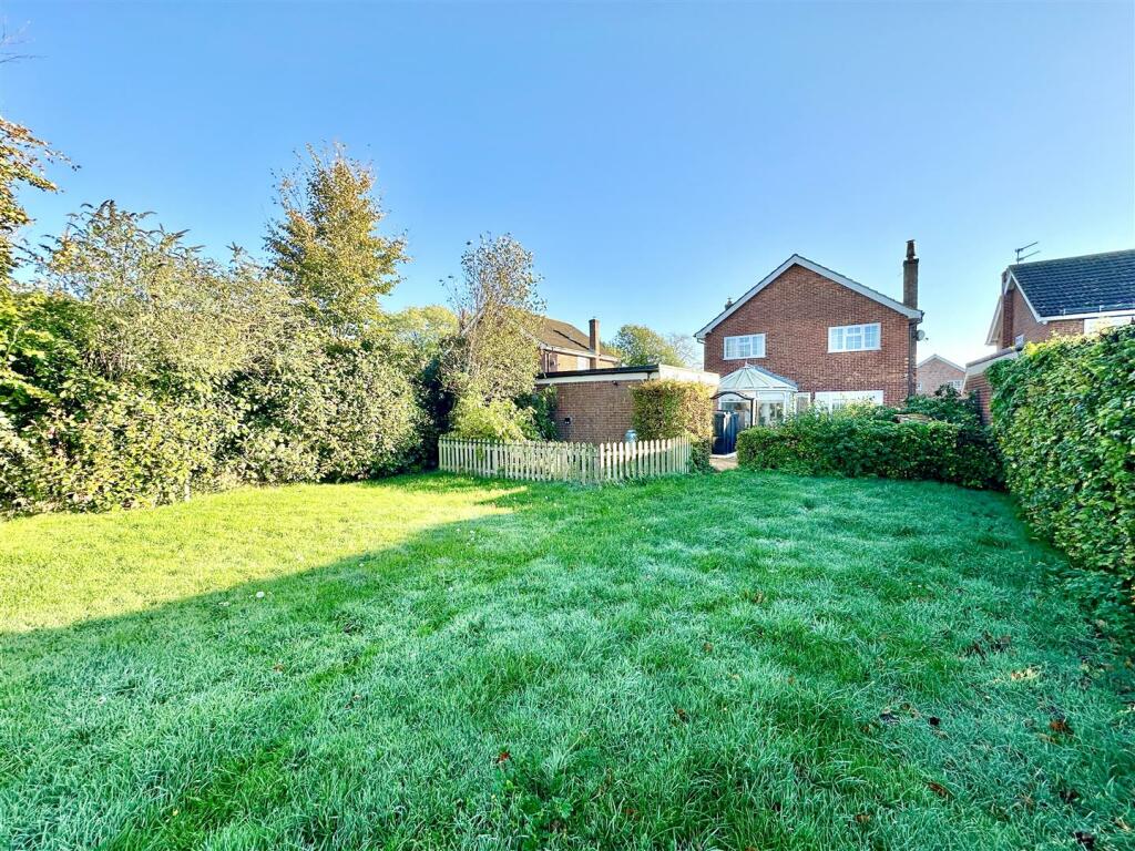 rear aspect and garden