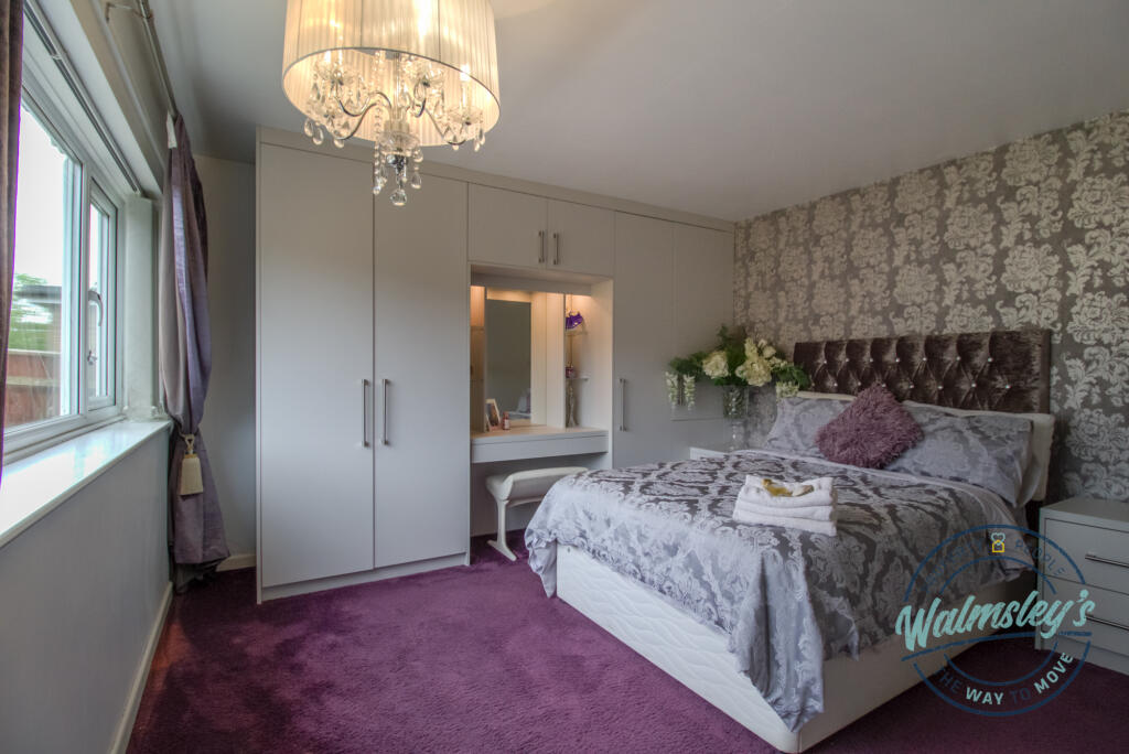 Main bedroom with fitted wardrobes