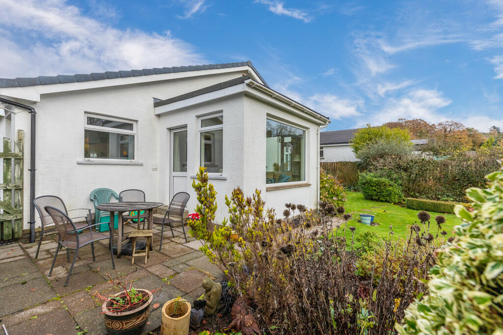 Rear patio and ga...