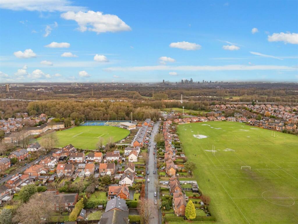 Views of Cricket Club Front and Playing Fields Rea