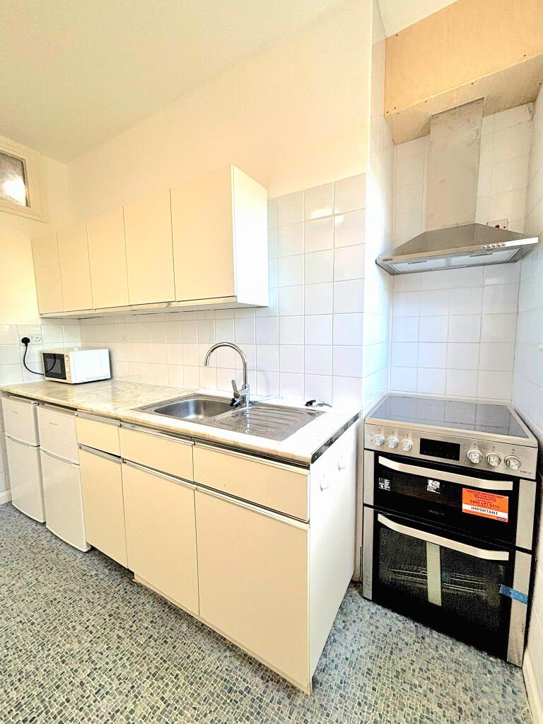 Shared kitchen with 1st floor rooms.