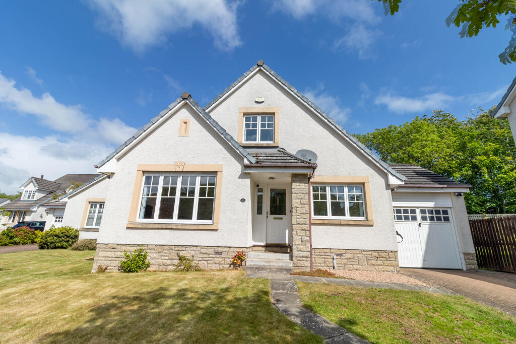 Front Elevation, Drive And Garage