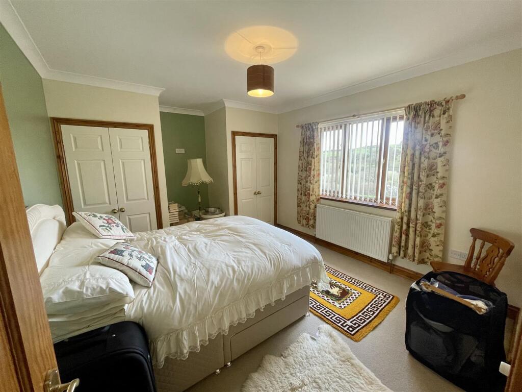 REAR BEDROOM