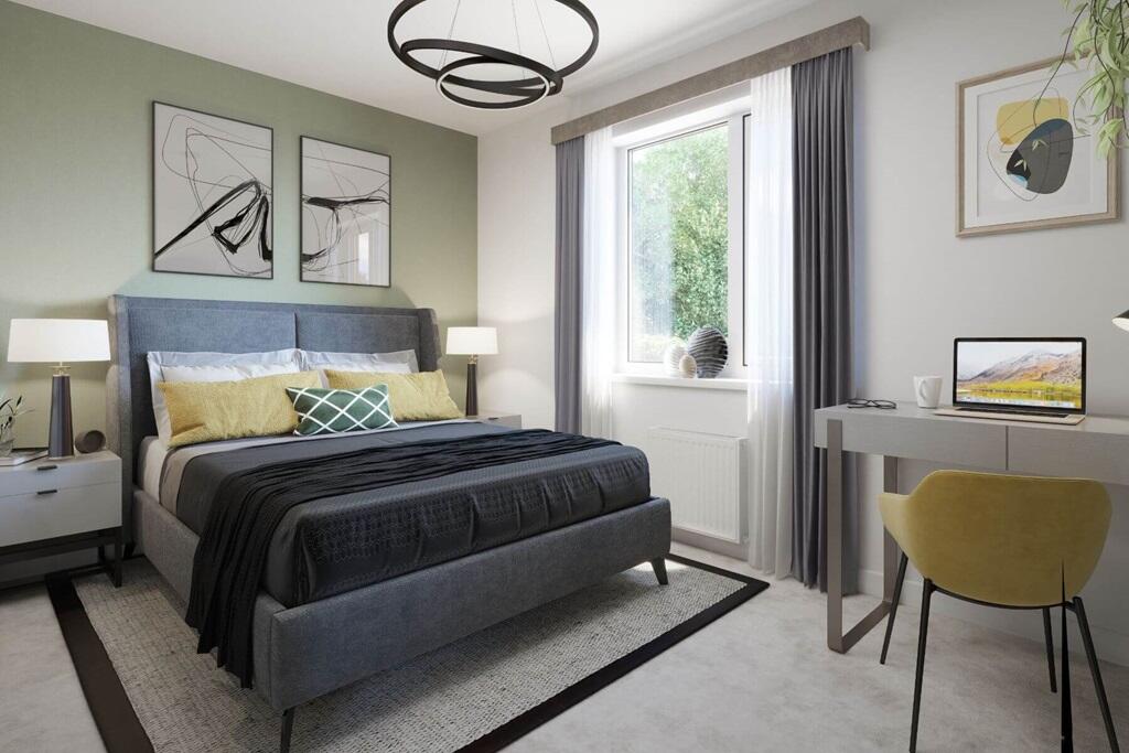 The main bedroom sits to the back of the home, overlooking the garden