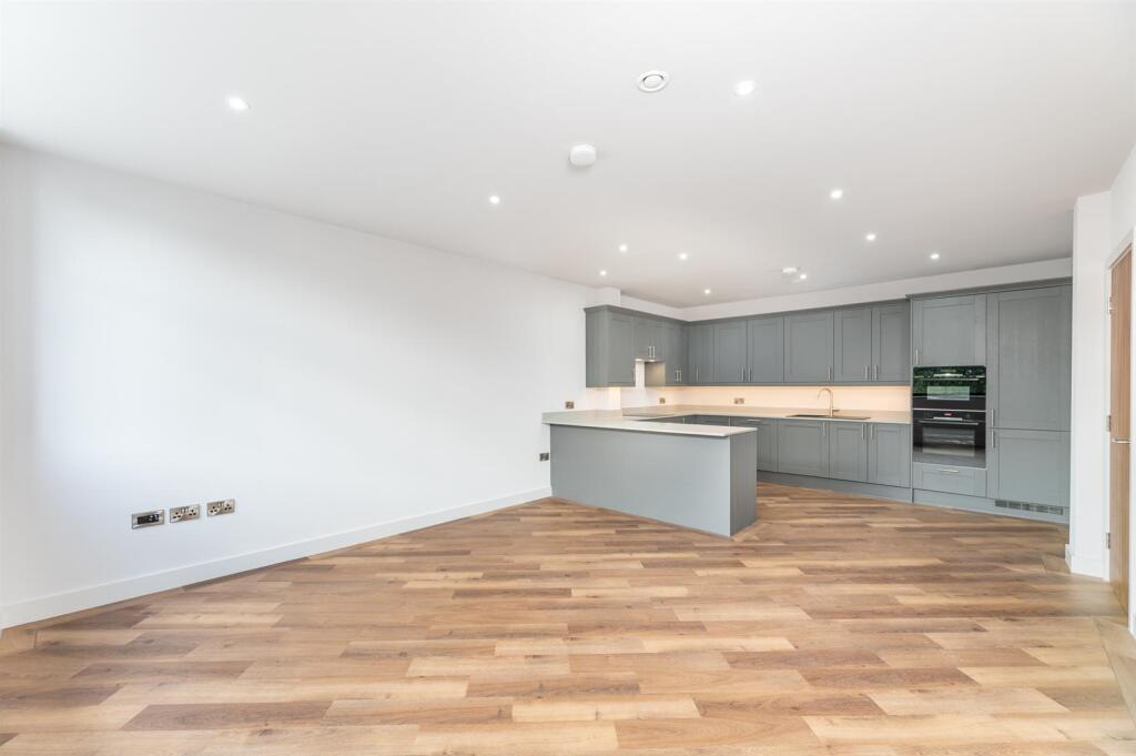 Living Area To The Kitchen