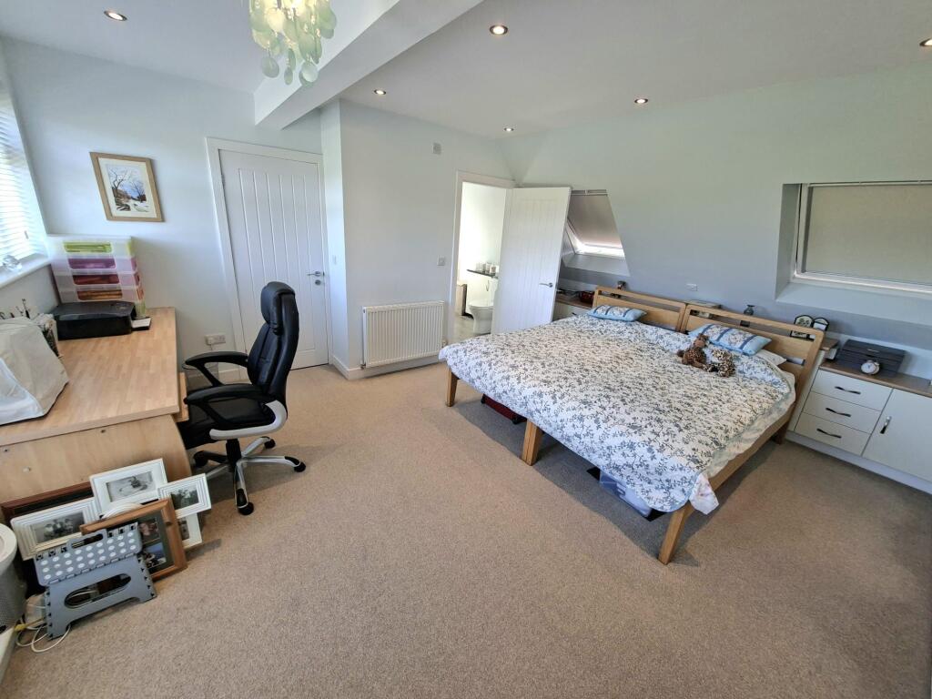 BEDROOM ONE AND EN-SUITE BATHROOM