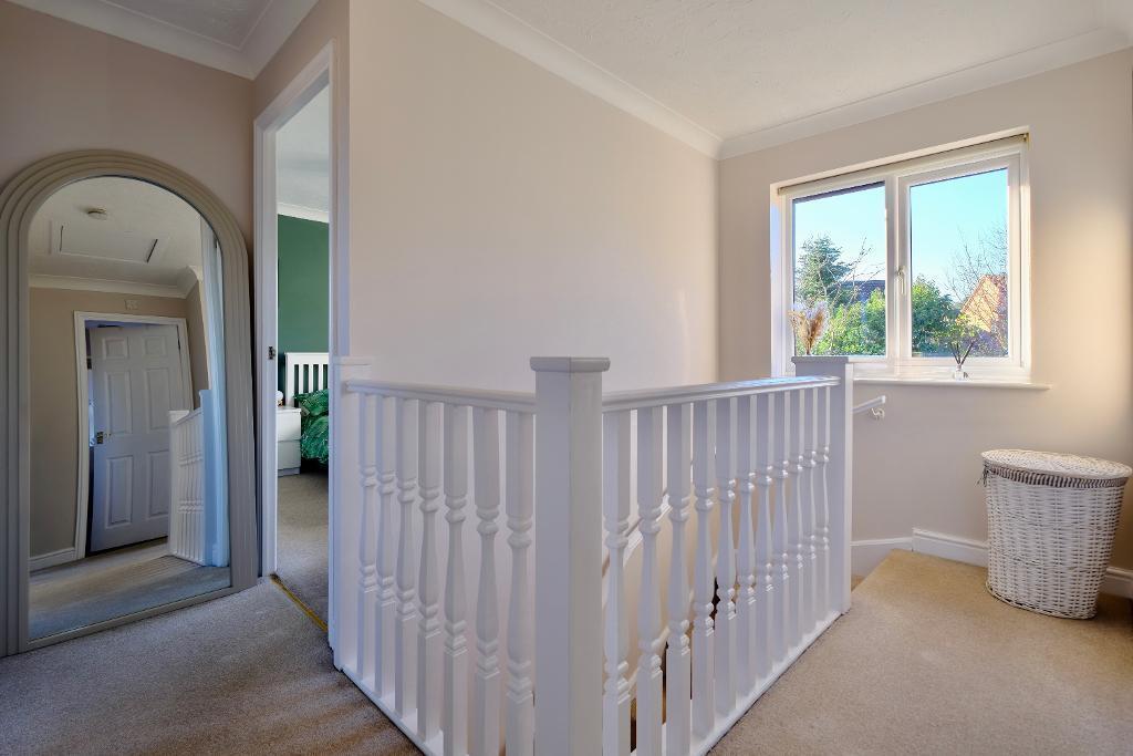 Sunny landing to 4 bedrooms