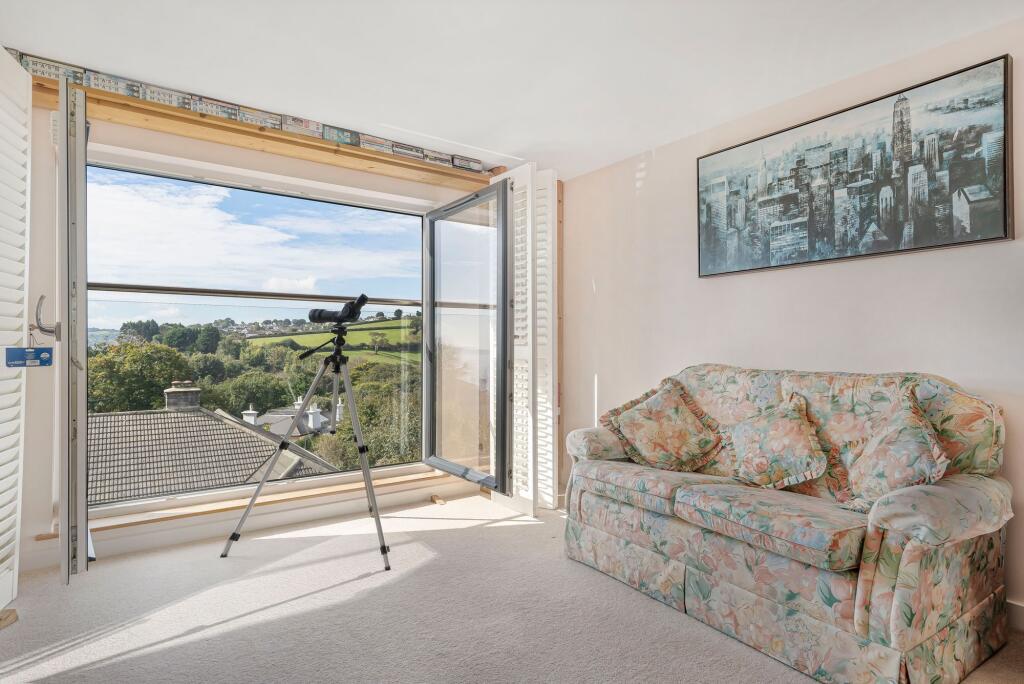 Bedroom with rural and sea views