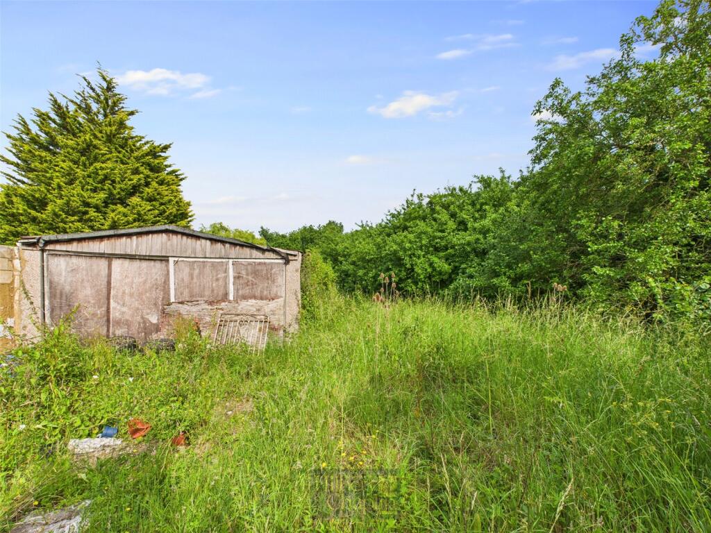 Land W Outbuilding