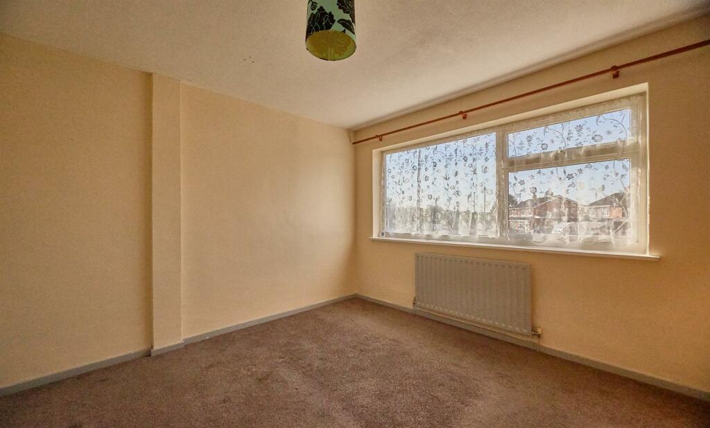 FRONT BEDROOM ONE