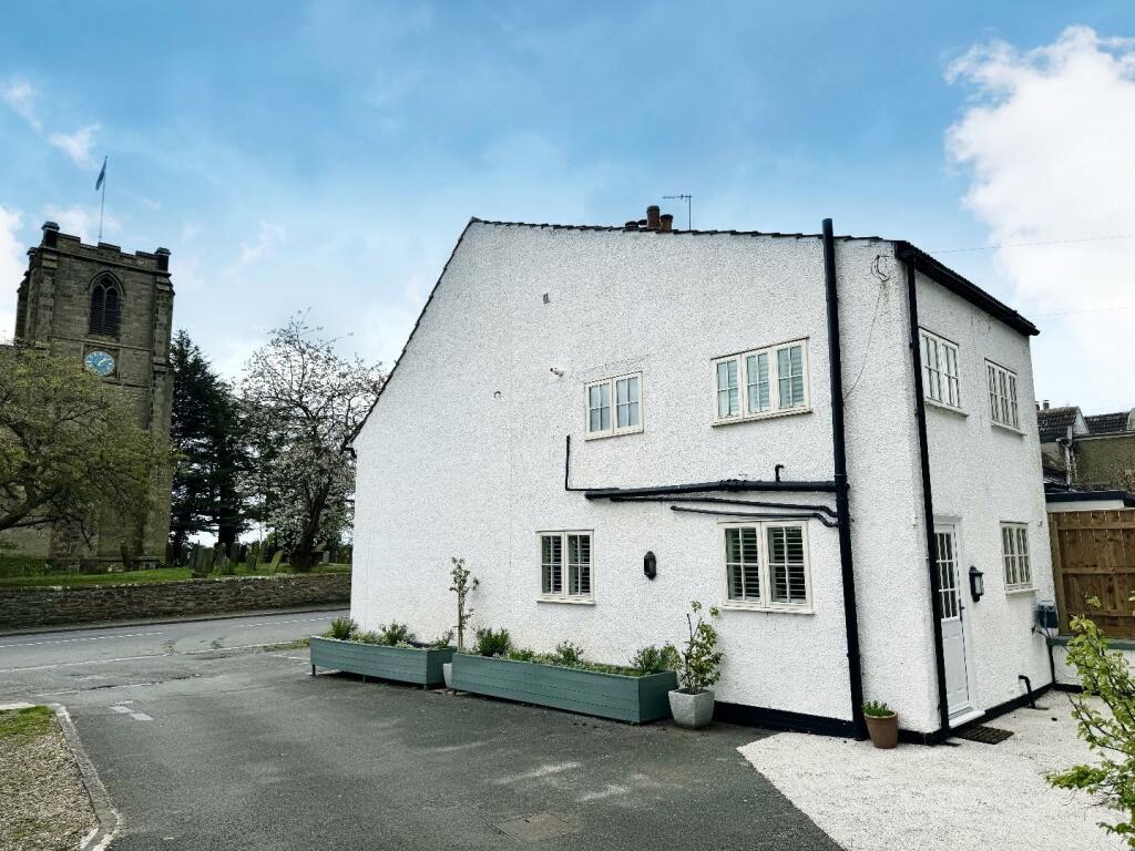 VIEW ACROSS TO CHURCH