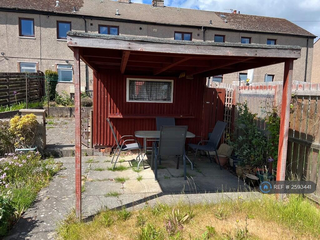 Garden Shed &amp; Covered Outdoor Seating Area