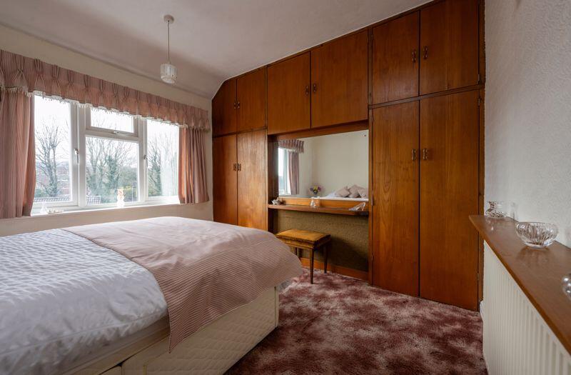 BEDROOM NO. 1 (FRONT) with wardrobes