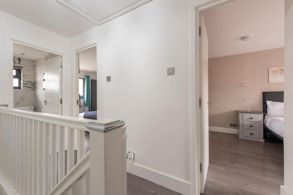 Bright and clean hallway with fresh white walls...