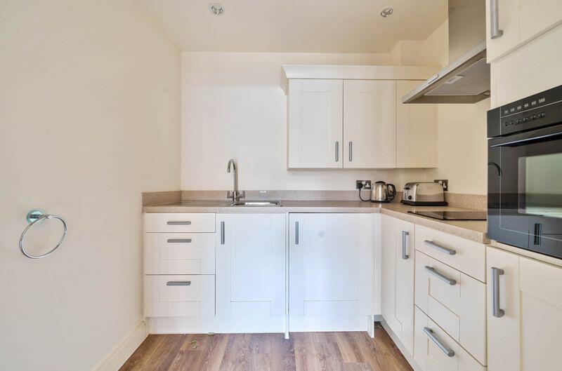 Kitchen with built-in appliances