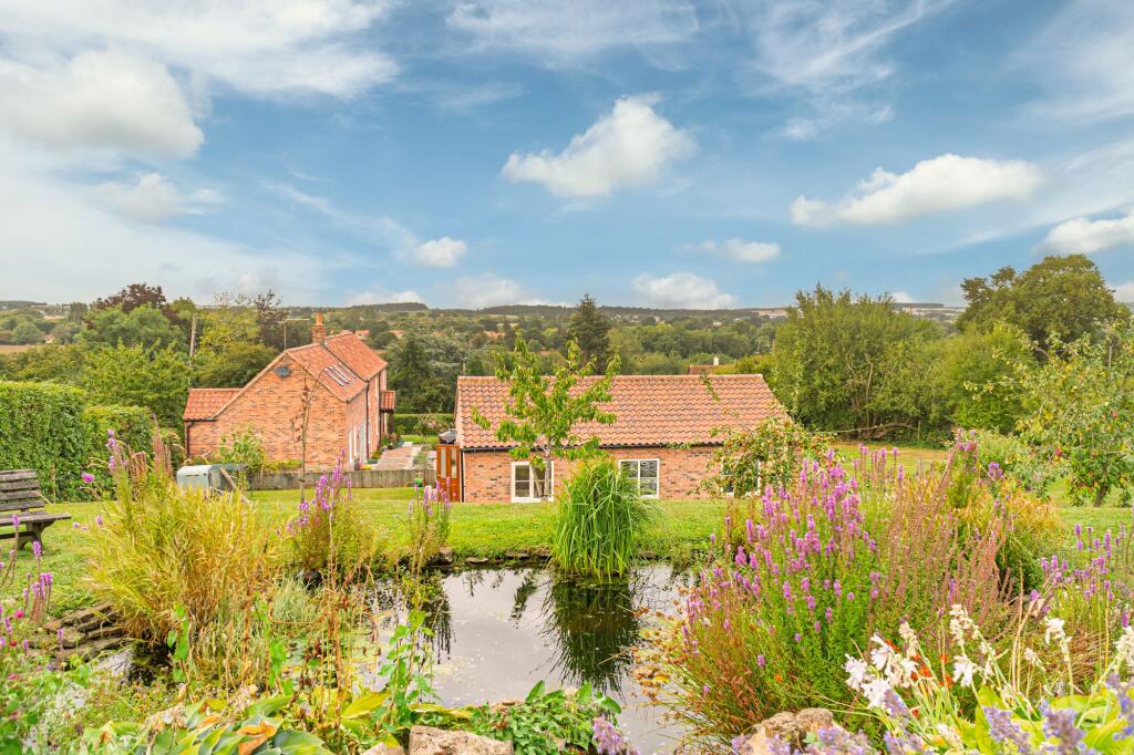 Tiered plot with far reaching countryside views