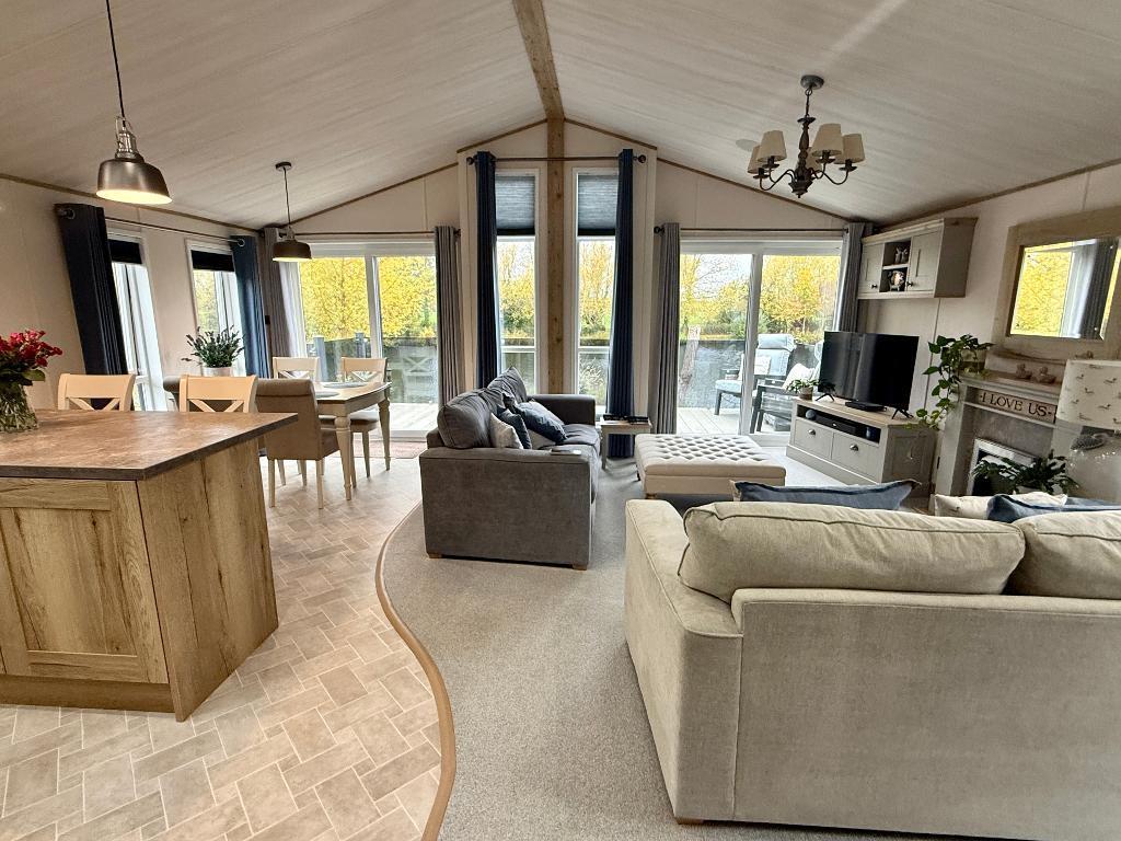 Open plan sitting room / kitchen dining