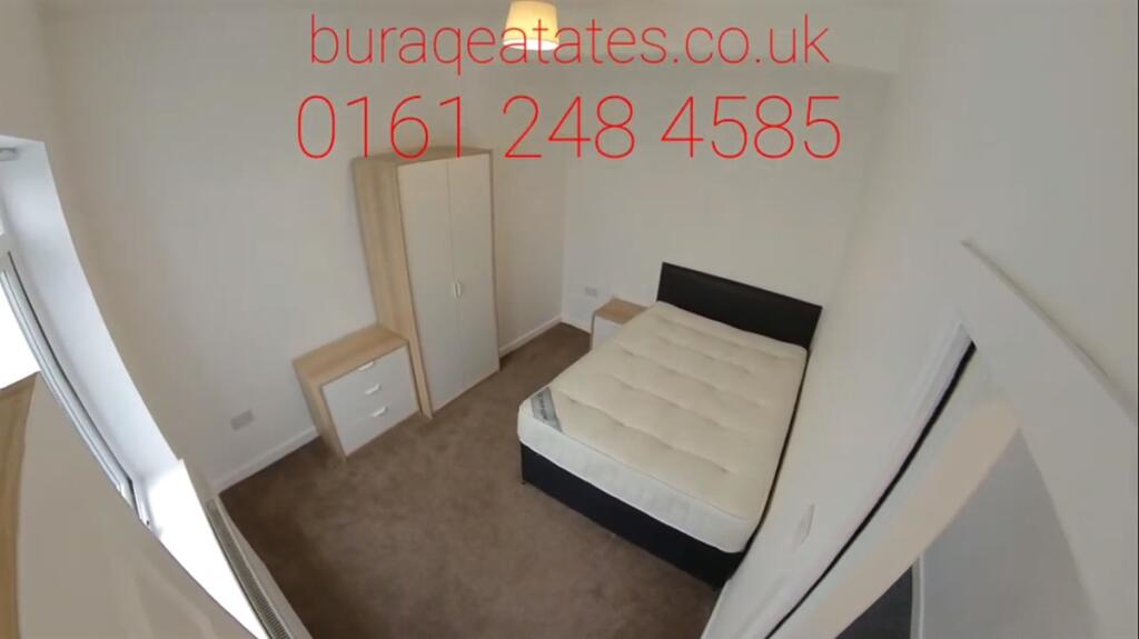 Bright, simply furnished double bedroom with ne...