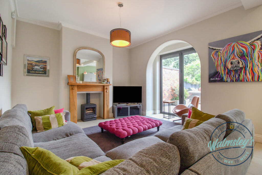 Family area off open plan kitchen dining spaces