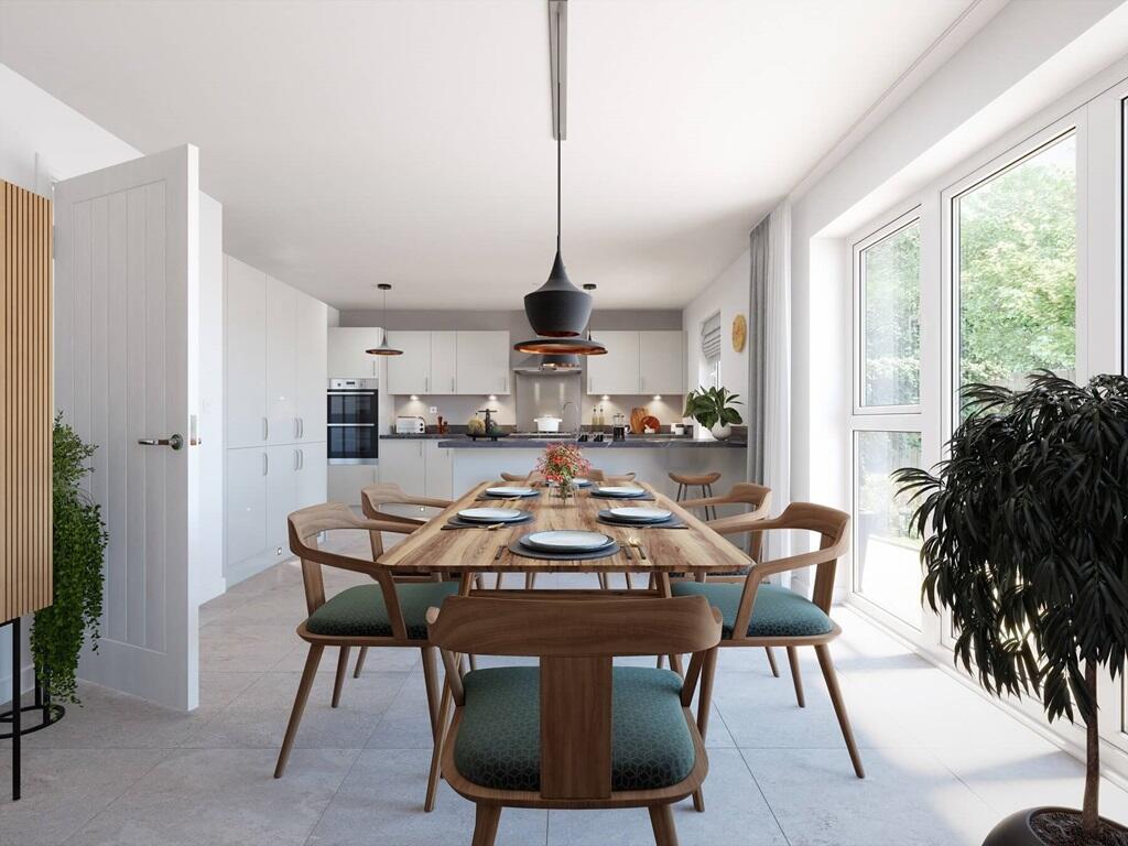 The dining area offers a sociable atmosphere to dine - typical Taylor Wimpey home