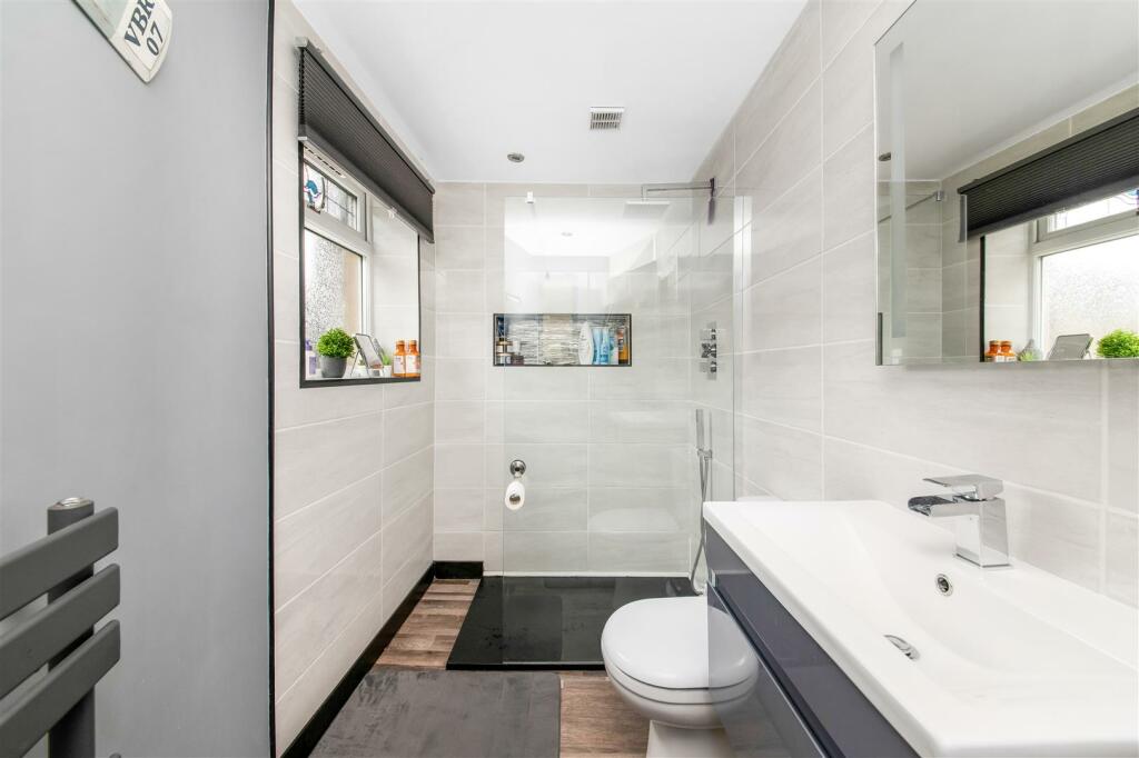 BEDROOM ONE EN-SUITE SHOWER ROOM