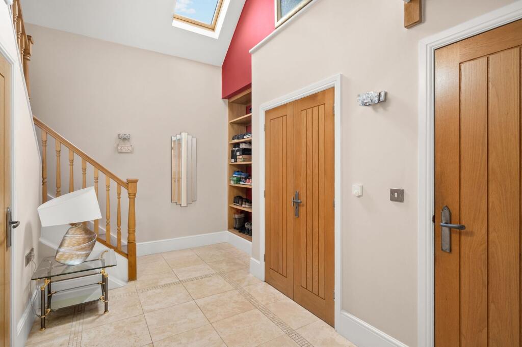 Boot Room and Staircase to Studio/Games Room