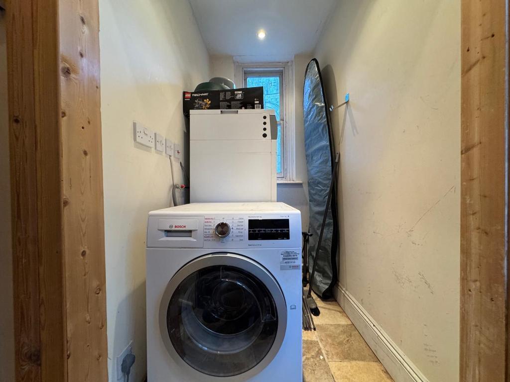 Separate utility area across hallway