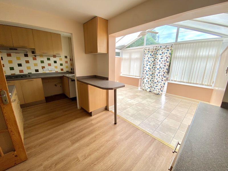 Kitchen And Sun Lounge