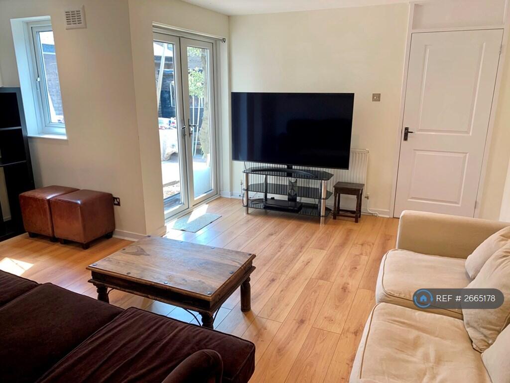 Living Room - Double Doors To Courtyard