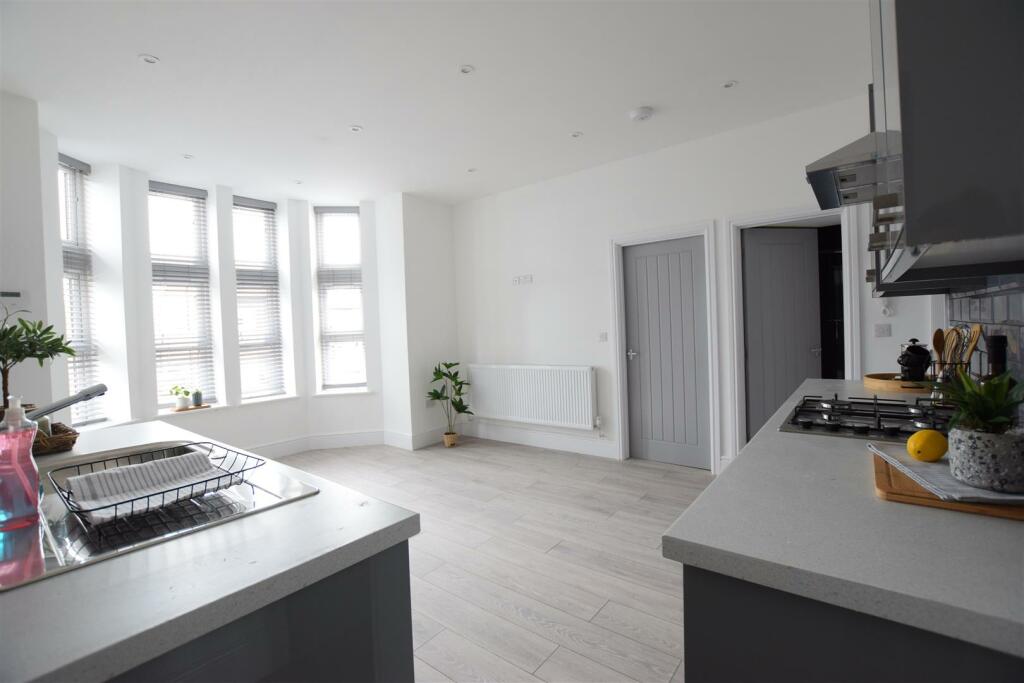 Apt 6 Living Kitchen.JPG