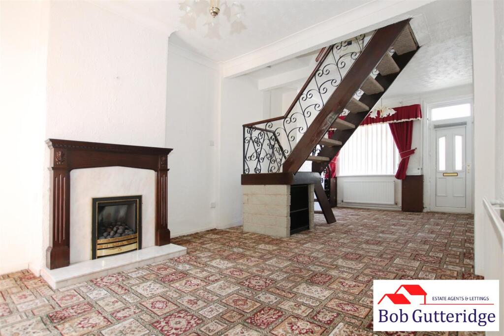 THROUGH LOUNGE / DINING ROOM