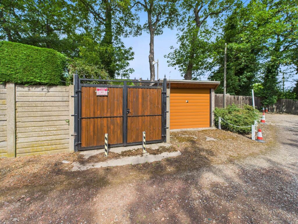 Driveway and garage to rear