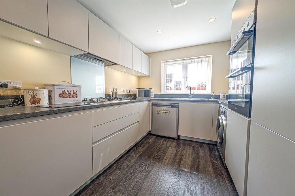 PXL_20250321_105637040.RAW-01 KITCHEN.COVER.jpg