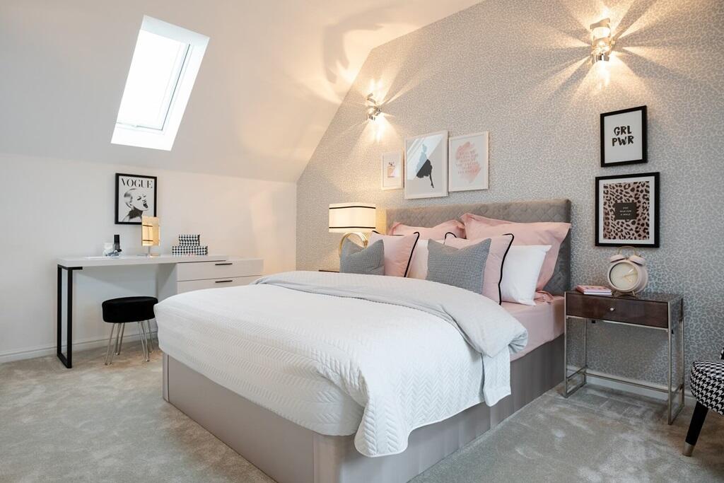 Bedroom 2 welcomes plenty of natural light