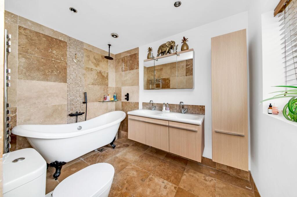 BEDROOM ONE EN-SUITE BATHROOM