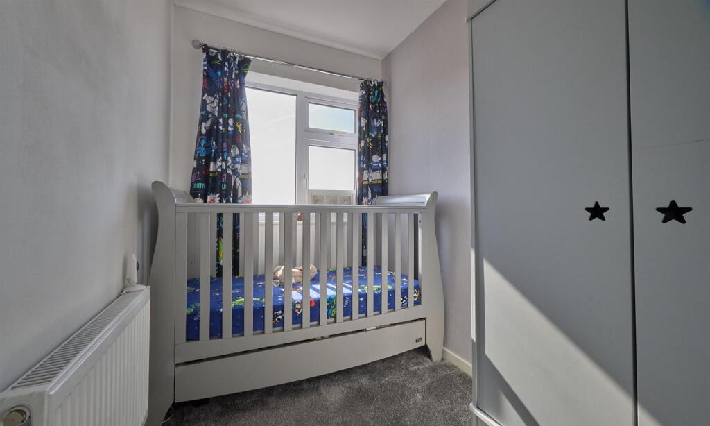 REAR BEDROOM THREE