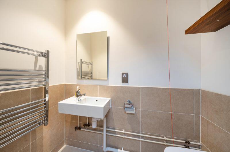 Cloakroom with WC and basin