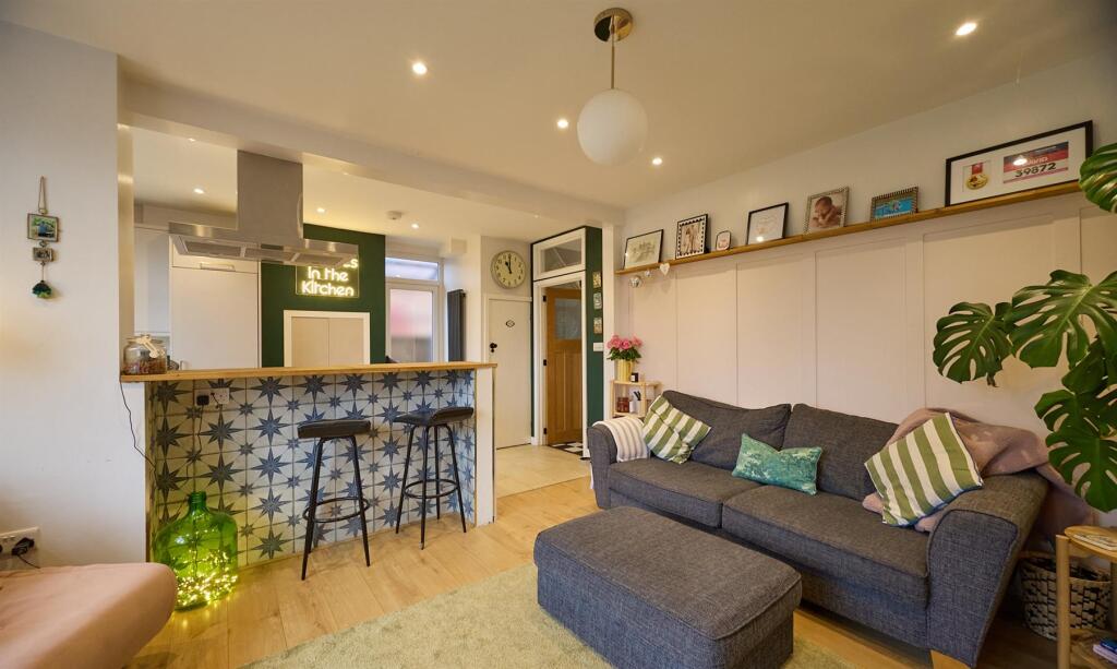 OPEN PLAN LIVING, DINING AND REFIITTED KITCHEN