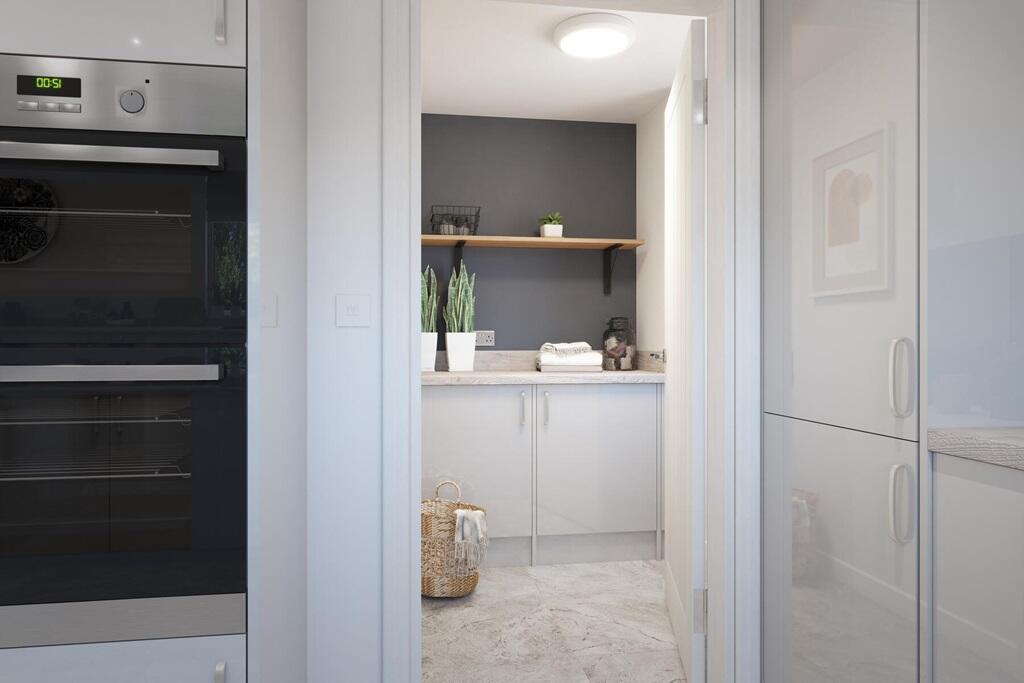 A utility room allows for separate area to do the laundry