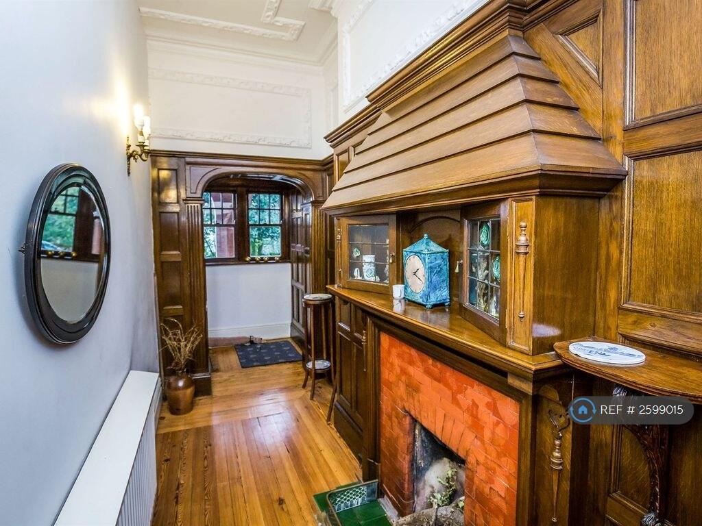 Entrance Hall With Fireplace 
