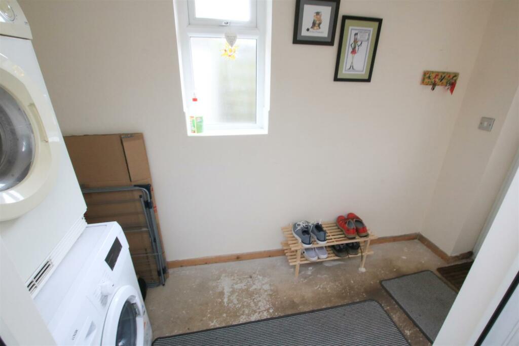 ENTRANCE AND UTILITY PORCH