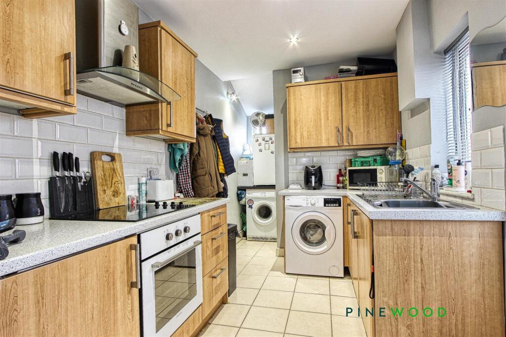 KITCHEN AND UTILITY AREA