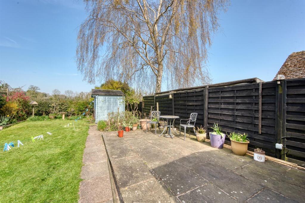 Rear Garden - raised dining patio.jpg