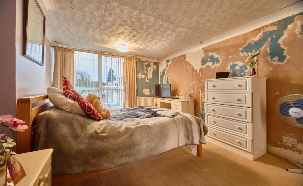FRONT BEDROOM ONE